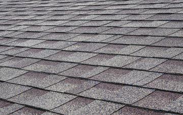Overbister tiles for shallow pitch roofing